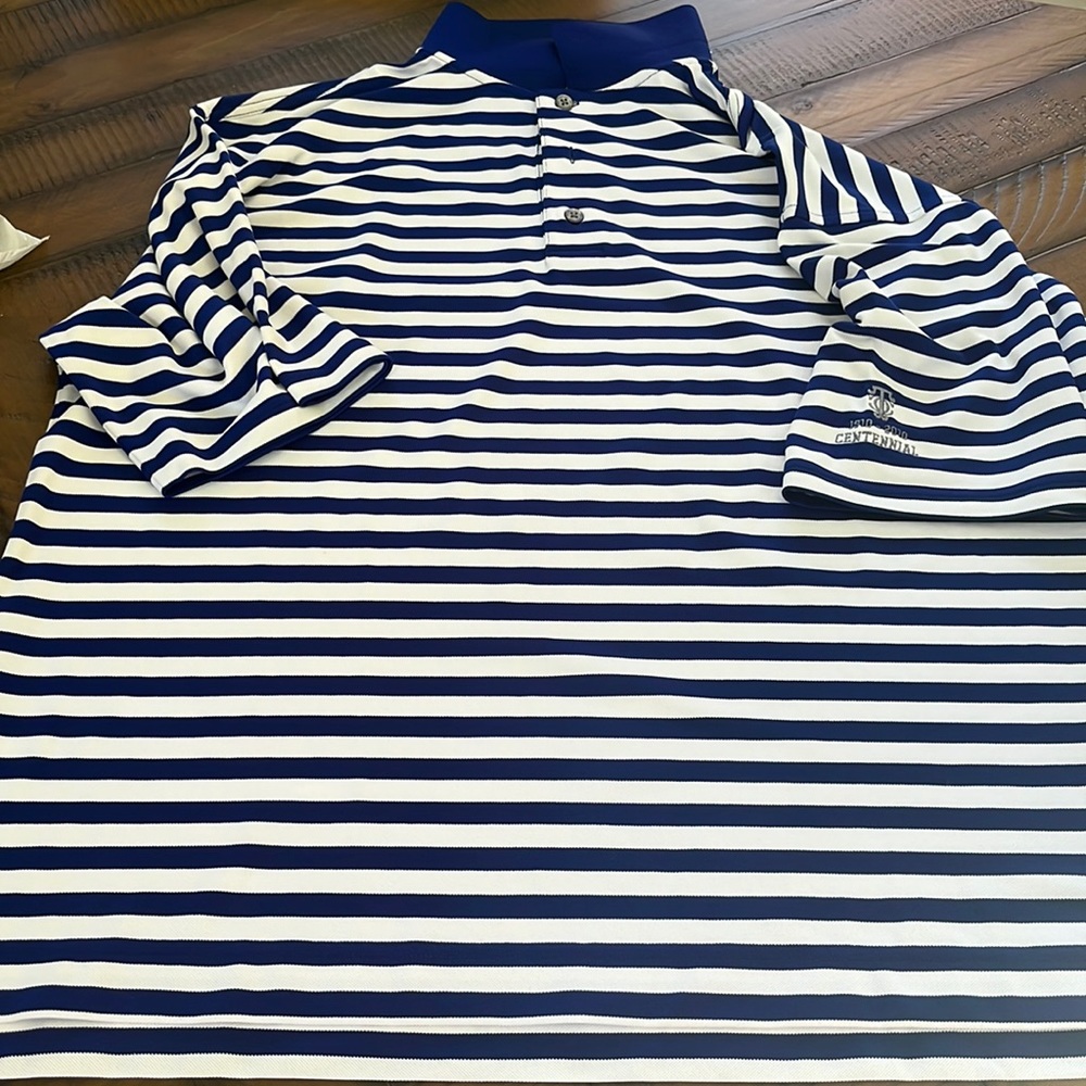 Footjoy golf polo. Logo on arm. Size large. Never worn!